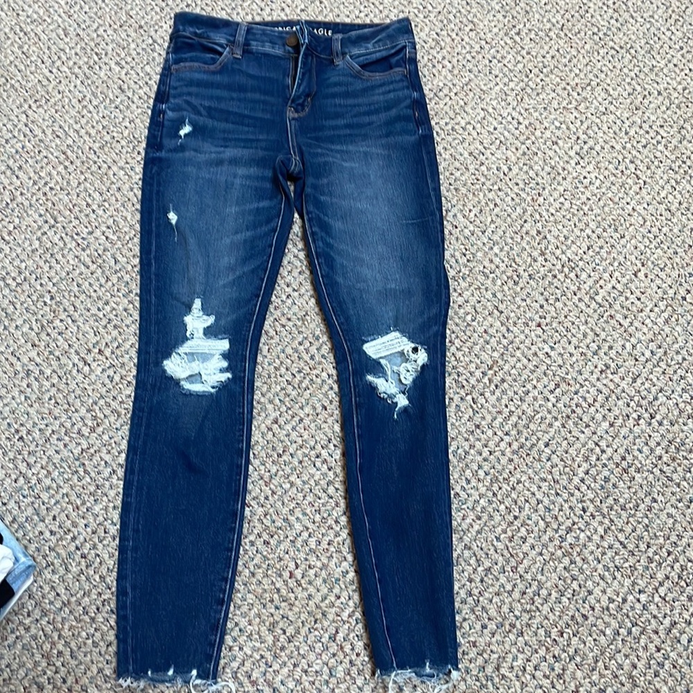 Dark blue ripped jeans